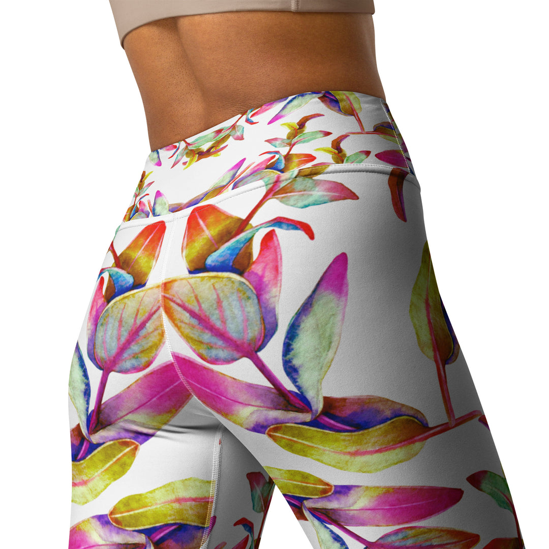 Women's high-waist yoga leggings featuring a vibrant floral print on a white background with enyohouse logo. Showing the inner pocket. Soft, stretchy, and perfect for workouts, yoga, and activewear fashion